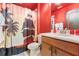 Themed bathroom with a boat-themed shower curtain, nautical decor, and ample vanity space at 8900 Candy Palm Rd, Kissimmee, FL 34747