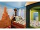 Whimsical train-themed bedroom, perfect for children, with custom mural and playful sleeping space at 8900 Candy Palm Rd, Kissimmee, FL 34747