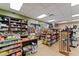 Bright market area with ample shelving, checkout counter and tile flooring at 8900 Candy Palm Rd, Kissimmee, FL 34747