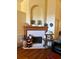 Cozy living room featuring a fireplace with a white tile surround and a decorative mantel at 1011 Piedmont Oaks Dr, Apopka, FL 32703