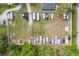 Aerial view of an RV and boat storage lot surrounded by trees and residential properties at 105 Lena Ann Dr, St Cloud, FL 34771