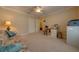 Spacious bedroom with a ceiling fan, closet, and a work desk at 105 Lena Ann Dr, St Cloud, FL 34771