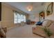 Inviting living room with natural light, comfortable seating, and neutral decor at 105 Lena Ann Dr, St Cloud, FL 34771