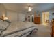 Comfortable main bedroom featuring a walk-in closet, ensuite bathroom, and natural light at 105 Lena Ann Dr, St Cloud, FL 34771