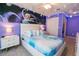 Frozen themed bedroom with a bed, two nightstands, and closet at 1507 Carey Palm Cir, Kissimmee, FL 34747