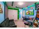 Spacious game room featuring multiple arcade games, modern decor and furnishings at 1507 Carey Palm Cir, Kissimmee, FL 34747