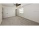 Bright and airy bedroom featuring a ceiling fan, closet space, and a window with blinds at 1606 Wildcat Ct, Winter Springs, FL 32708