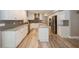 Updated kitchen with stainless steel appliances, granite countertops, long island and trendy backsplash at 1606 Wildcat Ct, Winter Springs, FL 32708