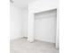 Spacious bedroom closet with shelving for ample storage and tile flooring at 16893 Sw 17Th Ter, Ocala, FL 34473