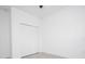 Bedroom with tile flooring, closet, and neutral paint at 16893 Sw 17Th Ter, Ocala, FL 34473