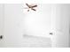 Bright bedroom features a ceiling fan, neutral paint, and tile flooring at 16893 Sw 17Th Ter, Ocala, FL 34473