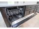 Modern dishwasher, nestled under sleek countertops and cabinetry in the kitchen at 16893 Sw 17Th Ter, Ocala, FL 34473