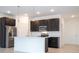 Beautiful kitchen featuring stainless steel appliances, pendant lighting, and a center island at 16893 Sw 17Th Ter, Ocala, FL 34473
