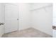Room with tile flooring, closet with shelving, and neutral paint at 16893 Sw 17Th Ter, Ocala, FL 34473
