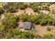 Expansive home with screened-in pool is surrounded by mature trees in an idyllic setting at 19715 Eaglesview Cir, Umatilla, FL 32784