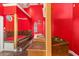 Elegant bathroom showcasing a red platform tub and double vanity, providing a spa-like experience at 19715 Eaglesview Cir, Umatilla, FL 32784