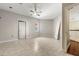 Bedroom with neutral walls, tile flooring, ceiling fan and direct access to the second floor landing at 19715 Eaglesview Cir, Umatilla, FL 32784