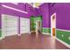 Bedroom with tiled flooring, large closets, and colorful wall accents at 19715 Eaglesview Cir, Umatilla, FL 32784
