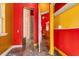 Hallway with tile floors leading to a unique glass-block shower and multiple rooms at 19715 Eaglesview Cir, Umatilla, FL 32784
