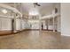 Open-concept living space with soaring ceilings, hardwood accents, and lots of natural light at 19715 Eaglesview Cir, Umatilla, FL 32784