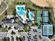 Aerial view of the community pool, clubhouse, tennis, and bocce ball courts at 2116 Limestone Trl, Kissimmee, FL 34747