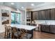 Spacious community kitchen with modern appliances, a large island, and ample cabinet space at 2116 Limestone Trl, Kissimmee, FL 34747