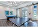 Inviting game room featuring a pool table, ping pong table, and stylish decor at 2116 Limestone Trl, Kissimmee, FL 34747