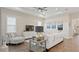 Stylish living room with modern furnishings, wood floors, recessed lighting, and lots of natural light at 2116 Limestone Trl, Kissimmee, FL 34747
