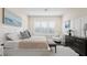 Bright bedroom with a large window, ceiling fan and neutral decor at 2116 Limestone Trl, Kissimmee, FL 34747