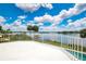 Rooftop balcony with pool, offers expansive lake views and bright skies at 2504 Gatlin Ave, Orlando, FL 32806