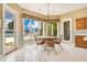Bright breakfast nook with lake views and tile flooring at 2504 Gatlin Ave, Orlando, FL 32806