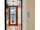 Wood-paneled elevator with window and lake view at 2504 Gatlin Ave, Orlando, FL 32806