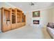 Comfortable living room with built-in shelving and a fireplace at 2504 Gatlin Ave, Orlando, FL 32806