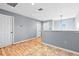 Bright loft space with fresh paint, and a distinctive round window at 2831 Orange Haven Way, Kissimmee, FL 34746