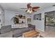 Comfortable living room with neutral walls, tile flooring, and a cozy grey sectional sofa at 2833 Ne 18Th Ct, Ocala, FL 34470