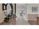 Open hallway view showing decor and design details leading to other rooms at 2972 Moulin Rd, Davenport, FL 33837