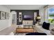 Stylish living room with modern furniture, decor, and an open layout at 2972 Moulin Rd, Davenport, FL 33837