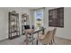 Cozy office with desk, shelving units, and a window providing natural light at 2972 Moulin Rd, Davenport, FL 33837