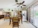 Bright eat-in kitchen featuring stainless steel appliances and a tiled floor at 32804 Blossom Ln, Leesburg, FL 34788