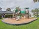 Community playground featuring slides and climbing structures, perfect for Gathering fun and outdoor activities at 339 Capron Ash Loop, Casselberry, FL 32707