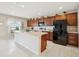 Modern kitchen featuring stainless steel appliances, a center island, and ample cabinet space at 365 Quarry Rock Cir, Kissimmee, FL 34758