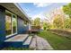 Well-maintained backyard with a wooden deck, offering outdoor enjoyment and relaxation at 38934 Sulen Rd, Lady Lake, FL 32159