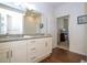 Large Primary bathroom with double sinks and granite counter tops at 5354 Diplomat Ct # 106, Kissimmee, FL 34746