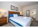 A large bedroom with wood furniture and soft carpet at 5354 Diplomat Ct # 106, Kissimmee, FL 34746