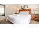 Tastefully decorated bedroom offers restful retreat with nightstands flanking the bed at 5354 Diplomat Ct # 106, Kissimmee, FL 34746