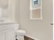 Bathroom featuring a window, white sink vanity and vinyl flooring at 5844 Galloping Dr, Apopka, FL 32712