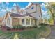 Inviting home featuring mature landscaping, neutral tones and an abundance of windows at 615 Richland Ct # 61, Altamonte Springs, FL 32714