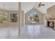 Bright living room featuring a fireplace, neutral walls, and vaulted ceiling at 615 Richland Ct # 61, Altamonte Springs, FL 32714