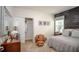 A themed bedroom features a fun chalkboard wall and themed decor at 6598 Lullaby Way, Mascotte, FL 34753
