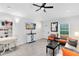 Well-lit living room featuring white walls, wood-look floors, comfortable seating, and a stylish dining area at 720 N Pennsylvania Ave, Winter Park, FL 32789